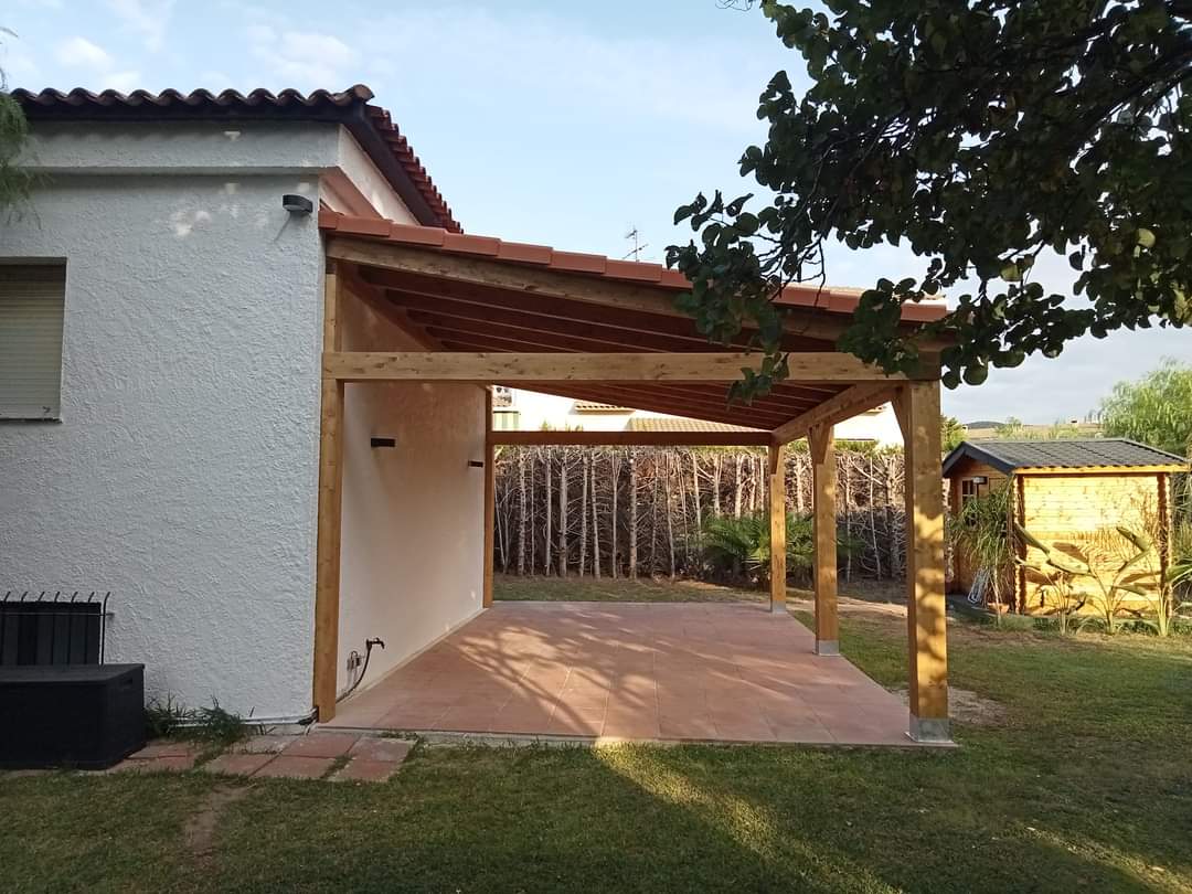Wooden patio beside house